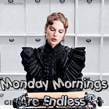 A Woman In A Black Dress Is Sitting In Front Of A Computer With The Words Monday Mornings Are Endless Written On It . GIF