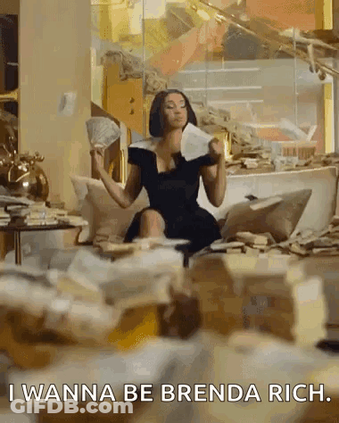 A Woman In A Black Dress Is Sitting On A Couch Holding A Fan Of Money And A Piece Of Paper . GIF