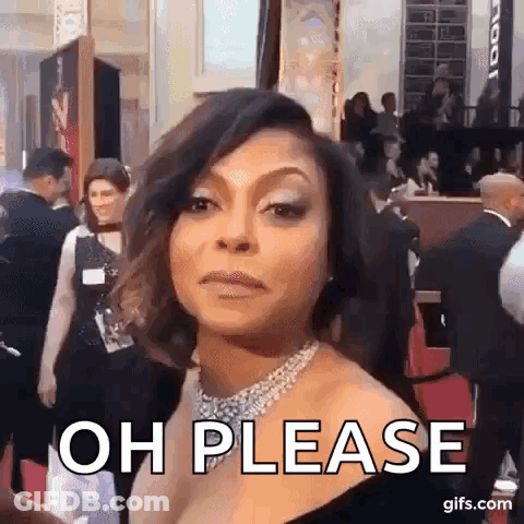 A Woman In A Black Dress Is Standing On A Red Carpet . GIF