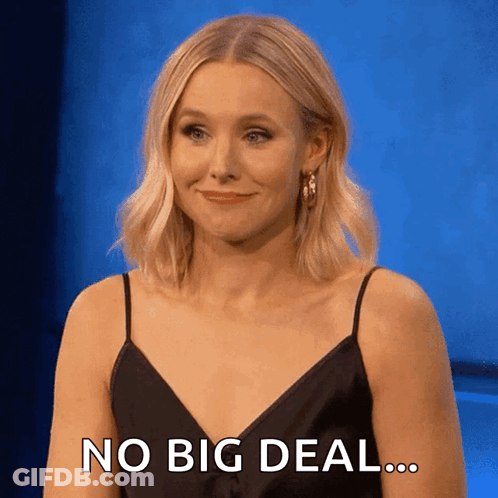 A Woman In A Black Dress Says " No Big Deal " In Front Of A Blue Background GIF