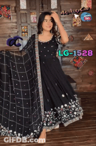 A Woman In A Black Dress With Lg-1528 Written On The Bottom GIF