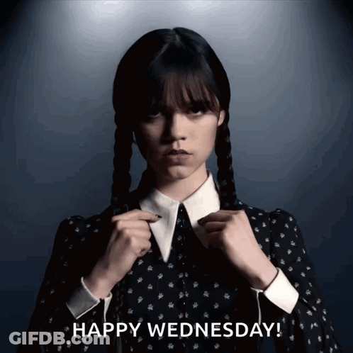 A Woman In A Black Dress With The Words Happy Wednesday Behind Her GIF