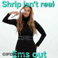 A Woman In A Black Dress With The Words Shrip Isn 'T Real Ems Out Behind Her GIF