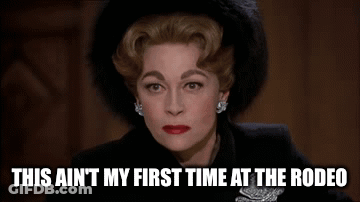 A Woman In A Black Hat Is Making A Funny Face And Saying `` This Ain T My First Time At The Rodeo '' GIF