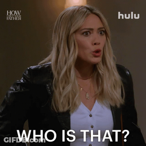 A Woman In A Black Jacket Is Asking Who Is That GIF
