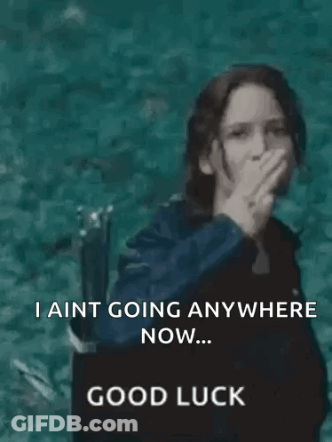 A Woman In A Black Jacket Is Giving The Middle Finger . GIF