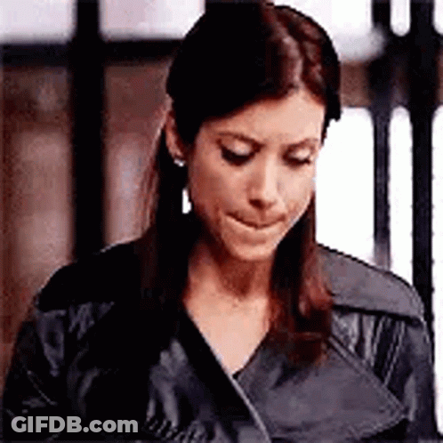 Woman In Black Leather Jacket Making Face GIF