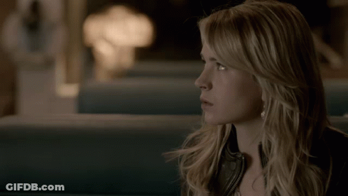 Woman In Black Leather Jacket Looking Side GIF