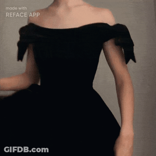 A Woman In A Black Off The Shoulder Dress Is Made With Reface App GIF
