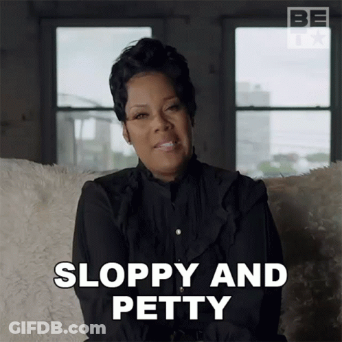 A Woman In A Black Shirt Is Sitting On A Couch And Saying Sloppy And Petty GIF