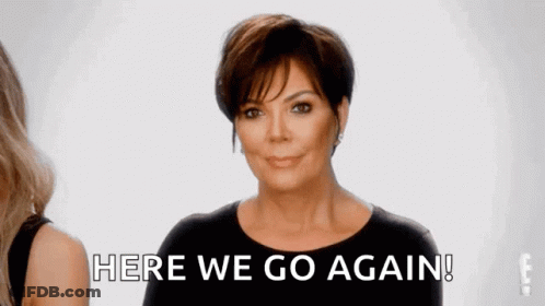 A Woman In A Black Shirt Is Smiling And Says Here We Go Again . GIF