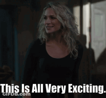 A Woman In A Black Shirt Is Smiling With The Words This Is All Very Exciting GIF