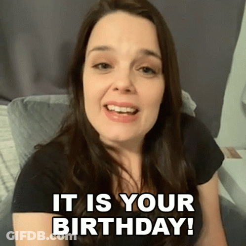 A Woman In A Black Shirt Says It Is Your Birthday . GIF