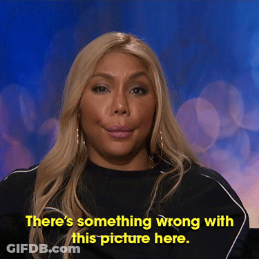 A Woman In A Black Shirt Says " There 'S Something Wrong With This Picture Here " GIF