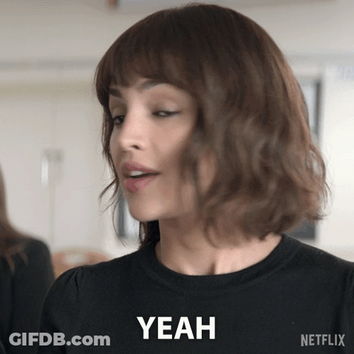 A Woman In A Black Shirt Says Yeah In A Netflix Ad GIF