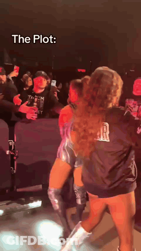A Woman In A Black Shirt That Says R On It GIF