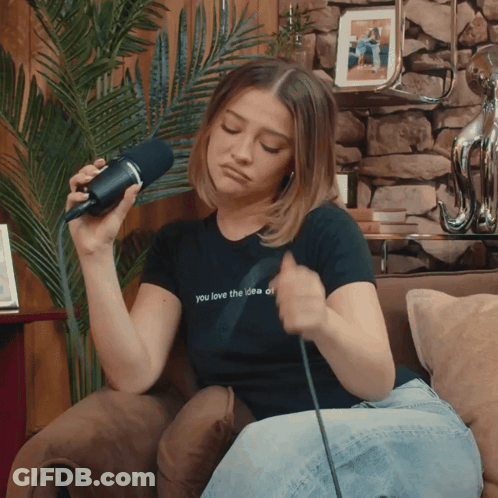 A Woman In A Black Shirt That Says You Love The Idea Of GIF