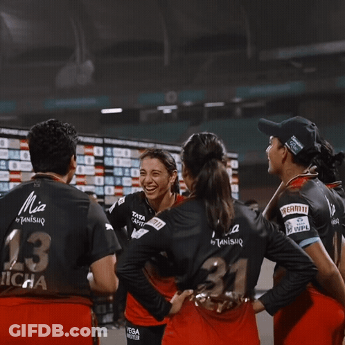 A Woman In A Black Shirt With The Number 31 On The Back GIF
