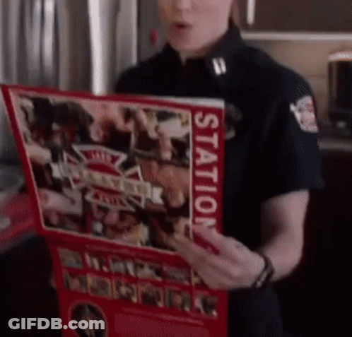 A Woman In A Black Uniform Is Holding A Red Book That Says Station On It GIF