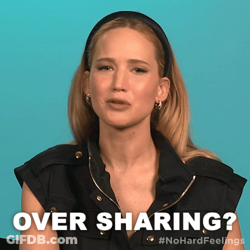 A Woman In A Black Vest Says Over Sharing On A Blue Background GIF