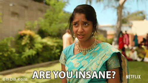 A Woman In A Blue And Gold Sari Is Asking Are You Insane ? GIF