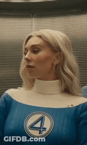 A Woman In A Blue And White Superhero Costume With The Number 4 On It . GIF