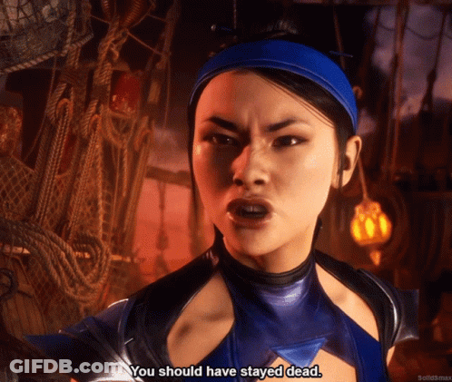A Woman In A Blue Costume Says You Should Have Stayed Dead GIF