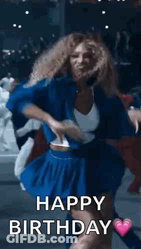 A Woman In A Blue Dress Is Dancing With The Words `` Happy Birthday '' . GIF