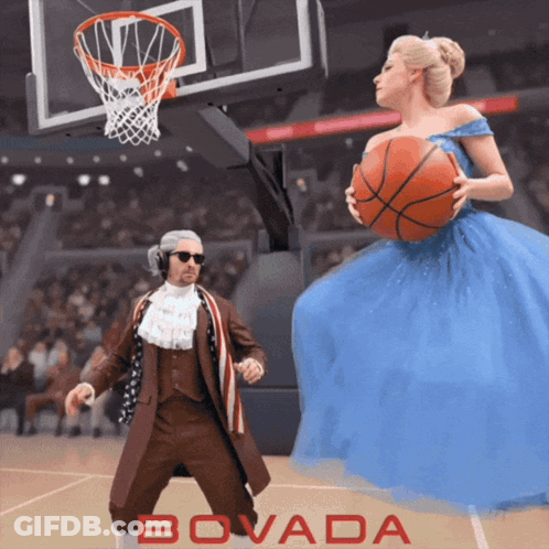 A Woman In A Blue Dress Is Holding A Basketball In Front Of A Man In A Suit With The Word Bovada On The Bottom GIF