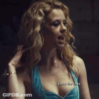 A Woman In A Blue Dress Is Saying " I Know The Lines " GIF