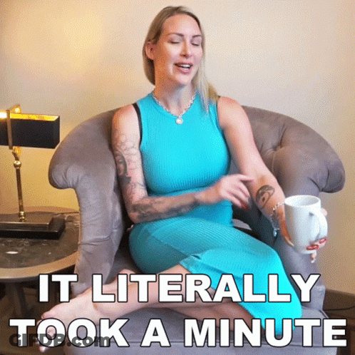 A Woman In A Blue Dress Is Sitting In A Chair Holding A Cup Of Coffee And Says It Literally GIF