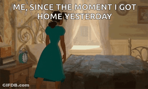 A Woman In A Blue Dress Is Standing In Front Of A Bed With The Words Me Since The Moment I Got Home Yesterday GIF