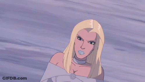 A Woman In A Blue Dress Is Standing In Front Of A Cloudy Sky GIF