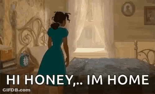 A Woman In A Blue Dress Is Standing Next To A Bed In A Bedroom And Looking Out The Window . GIF