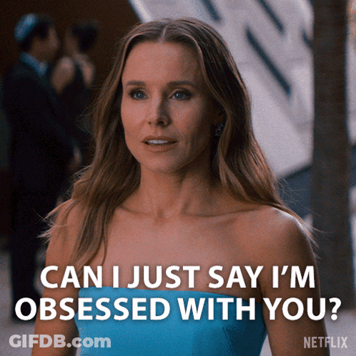 A Woman In A Blue Dress Says " Can I Just Say I 'M Obsessed With You ? " GIF