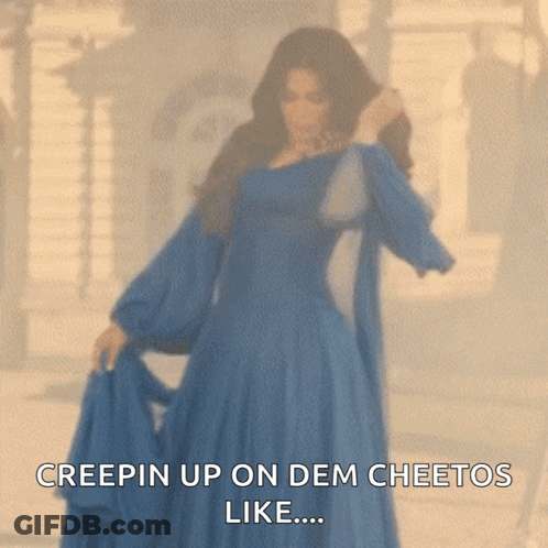 A Woman In A Blue Dress Says Creepin Up On Dem Cheetos Like ... GIF