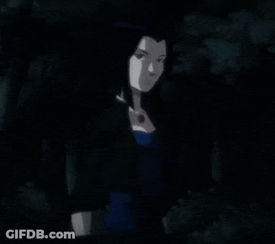 A Woman In A Blue Dress Stands Next To A Monster With Red Eyes GIF