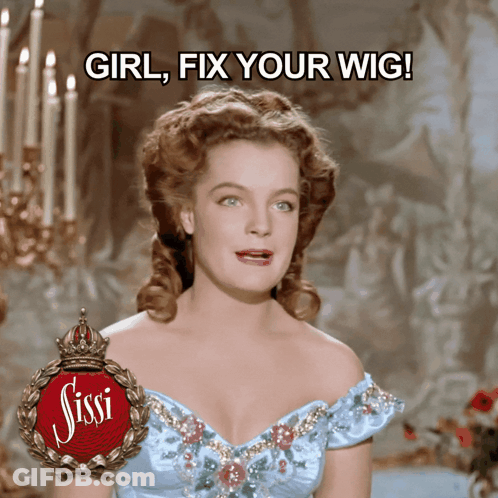 A Woman In A Blue Dress With The Words Girl Fix Your Wig Behind Her GIF