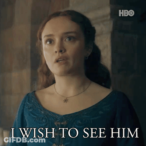 A Woman In A Blue Dress With The Words I Wish To See Him Below Her GIF
