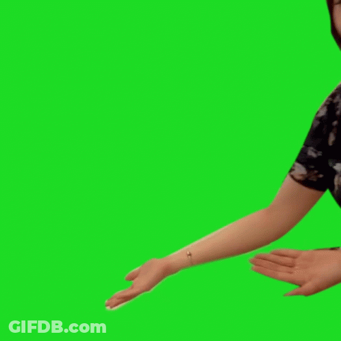 A Woman In A Blue Floral Dress Holds Out Her Hand GIF