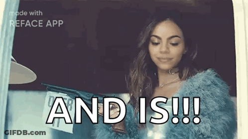 A Woman In A Blue Fur Coat Is Holding A Gun And Is ! GIF
