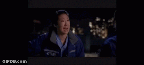 A Woman In A Blue Jacket Is Crying While Talking To Another Woman . GIF