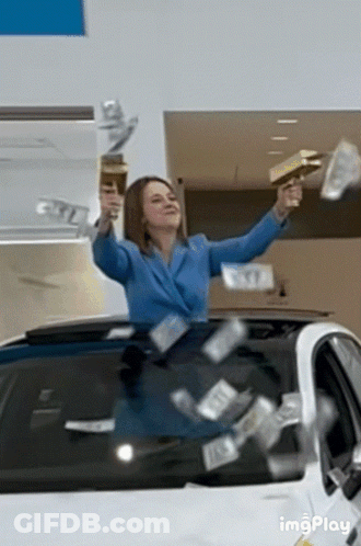 Woman In Blue Jacket Throwing Money In Air GIF