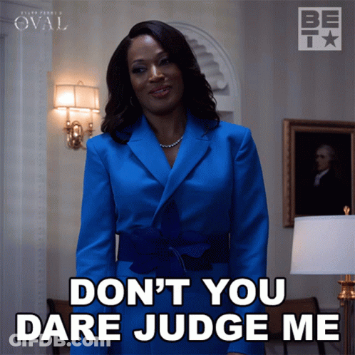 A Woman In A Blue Jacket Says " Don 'T You Dare Judge Me " GIF