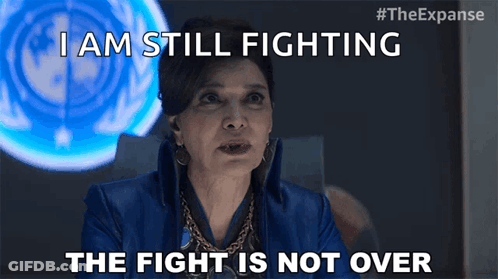 A Woman In A Blue Jacket Says I Am Still Fighting The Fight Is Not Over . GIF