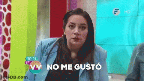 A Woman In A Blue Jacket Says " No Me Gusto " In Spanish GIF