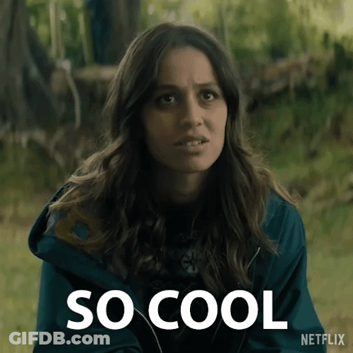 A Woman In A Blue Jacket With The Word So Cool Written On It GIF