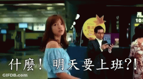A Woman In A Blue Off The Shoulder Top Stands In Front Of A Sign That Says 101 GIF