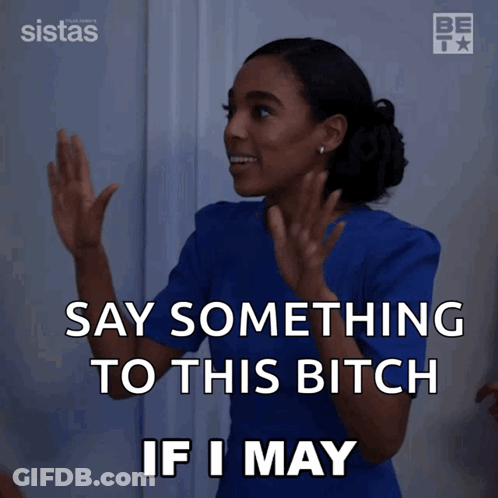A Woman In A Blue Scrub Top Says Something To This Bitch If I May GIF