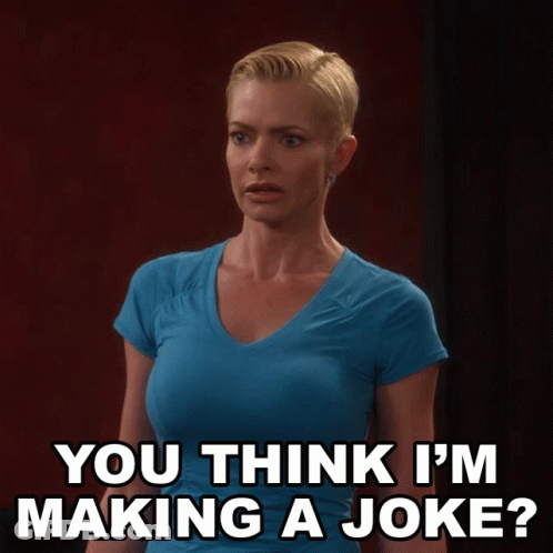 A Woman In A Blue Shirt Is Asking If She Is Making A Joke GIF